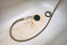 Extremely Dirty Bath Drain Mesh, Hole And Surface Covered With Limescale Or Lime Scale And Rust, Cleaning Calcified And Rusty Bathroom Equipment