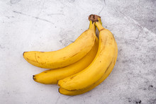 Fresh Bananas On Grey Background