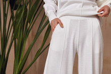 Detail Of Clothes Woman Beautiful Sexy  Wear White Cotton Knitted Suit Fashion Style For Casual Collection Accessory Interior Sand Color Safari Summer Shadow Cosmetic.