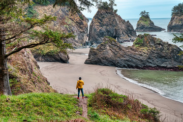 man hiking on the coast