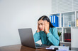 © Phushutter - Photo of young woman business lady tired hard working at home suffering terrible migraine in the room.