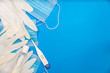 top view image of medical supplies to prevent infection on classic blue background