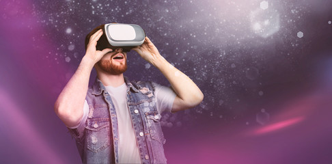 Poster - Happy young gamer having virtual reality glasses experience, creative collage, copy space. Panorama