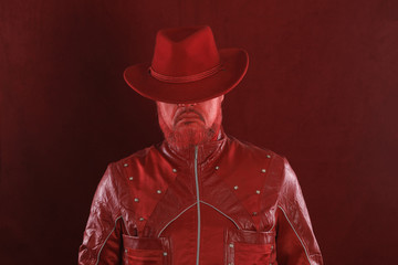 Poster - Studio shot closeup portrait of a bearded man in a red hat