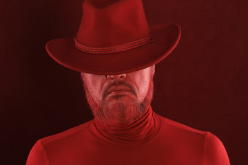 Wall Mural - close up of a red male beard and red mustache on a black background