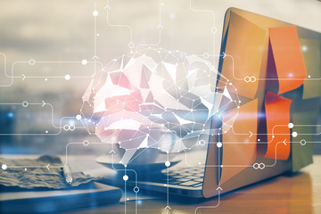 multi exposure of work space with computer and human brain hologram. brainstorm concept.