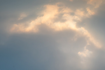 Wall Mural - landscape fantastic sunset or sunrise with rays of light through the sky. beautiful white clouds and