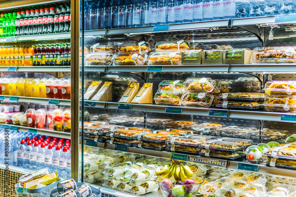 Pre-packaged foods displayed in a commercial refrigerator Stock Photo ...