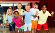 © JackF - Happy emotional children posing at modern dance class