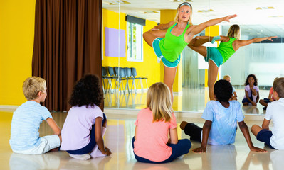 Wall Mural - Experienced positive dance instructor teaching preteen boys and