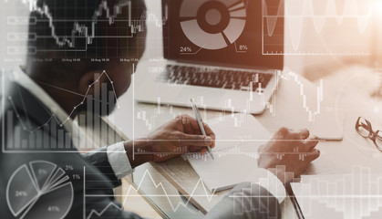 Poster - African American businessman with laptop working in office, collage with financial data on imaginary screen