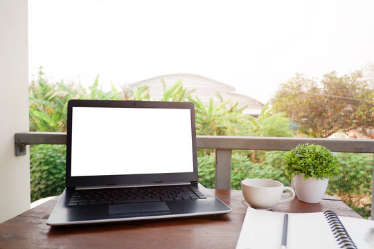 Cropped shot view of the labtop with blank copy space screen for your information content or text message. work from home view.