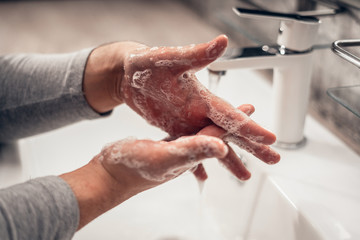  Coronavirus. Proper washing and handling of hands. Liquid antibacterial soap. Self-isolation and hygiene.