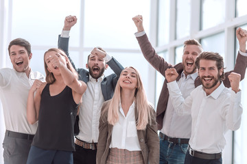 close up. a group of happy young business people.