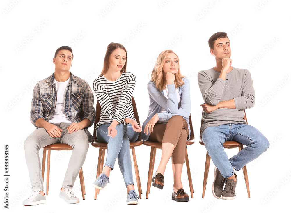 Young people waiting in line on white background