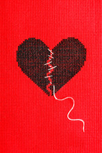 Black Broken Heart On Red Background. Embroidery.
