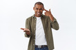 © Cookie Studio - Are you out of your mind. Portrait of angry, annoyed and pissed-off african-american man scolding person for being crazy or stupid, pointing at friend and touch temple, cand understand this behaviour