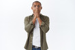 © Cookie Studio - Portrait of shocked, panicking african-american man, feel nervous, staring alarmed, hold hands on mouth gasping, facing terrible situation, scared of losing job during pandemia quarantine