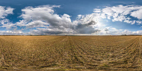 Wall Mural - full seamless spherical hdri panorama 360 degrees angle view on among fields in spring day with awesome clouds in equirectangular projection, ready for VR AR virtual reality content
