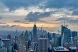 Fototapeta  - New York skyline from the top of  Top of the Rock (Rockefeller Center)sunset view in Winter with clouds in the sky
