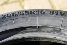 Side View Of Tire With Tire Width, Height And Wheel Diameter Designation