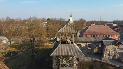 Latvia, Limbazi Medieval Castle Ruins. Aerial View of the 13 Th Century Castle. Stone Ruins With New Created High Observation Tower. Church and City in Background