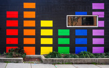 A Painted Wall Design Of Color Rectangles On An Urban Building.  City Mural