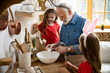 © Yakobchuk Olena - Cute children helping grandpa with cooking stock photo