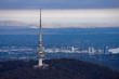 Aerial view over Canberra of Telstra Tower sunrise from hot air balloon