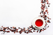 Food Frame With Cup And Petal Of Hibiscus Tea Isolated On White Background With Space For Text.