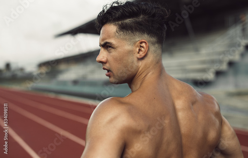 Fotografía Healthy young man standing on track field