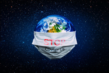 The whole earth is quarantined, the earth is wearing a mask Coronavirus and Air pollution pm2.5 concept. COVID-19 Elements of this image furnished by NASA