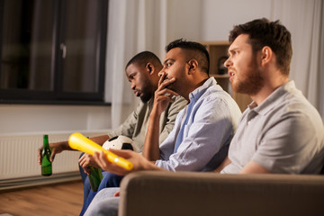 Sticker - friendship, sports and entertainment concept - disappointed male friends with soccer ball and vuvuzela watching football game at home