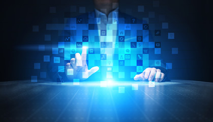 Application icons on virtual screen. Technology and business concept.