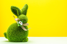 Cute Easter Bunny Made From Grass On Yellow Background. Easter Template With Copy Space