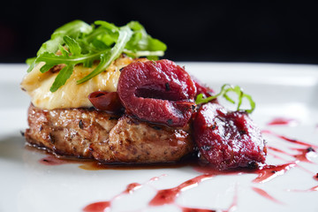 Wall Mural - Beef served with plums, mozzarella and rucola.