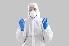 Man In Protective Gloves And Suit, Ready To Save Lives