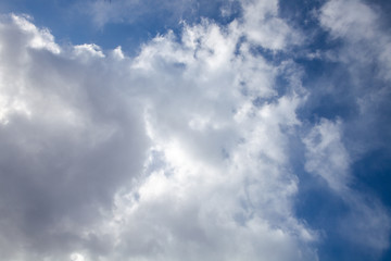 Poster - white clouds on a blue sky. background