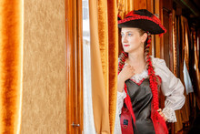 Beautiful Girl In Steampunk Costume In An Old Train Carriage