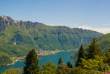 Fototapeta  - View of the Parco San Grato in Lugano, Switzerland. Alpine mountain scenery on a sunny summer day and views of Lake Lugano. 