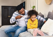 © Prostock-studio - African american father scolds little daughter. Girl offended
