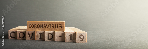Fotografía Coronavirus COVID-19 inscription on wooden blocks