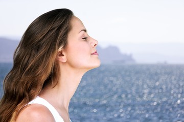 Wall Mural - Happy young woman with perfect skin on outdoor background