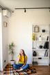 © Face Stock - Woman speaks on the phone at home