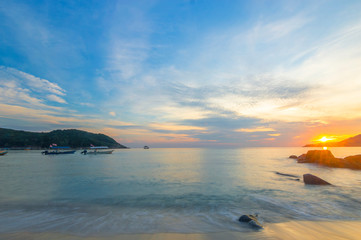 Wall Mural - Beach rock and sunrise background