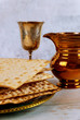 Pesah holiday celebration, matza unleavened bread and cup kosher wine