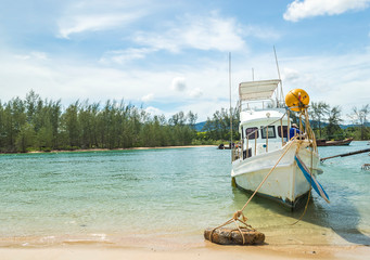 Wall Mural - Boats park at sea shore with cloudy weather