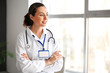 © Pixel-Shot - Portrait of young female doctor in clinic