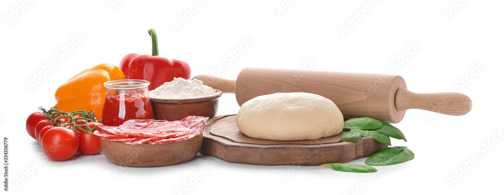 Ingredients for tasty pizza on white background