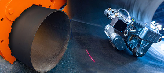 Poster - use of modern equipment during repair work. remote control robot. robot for finding the place of dam